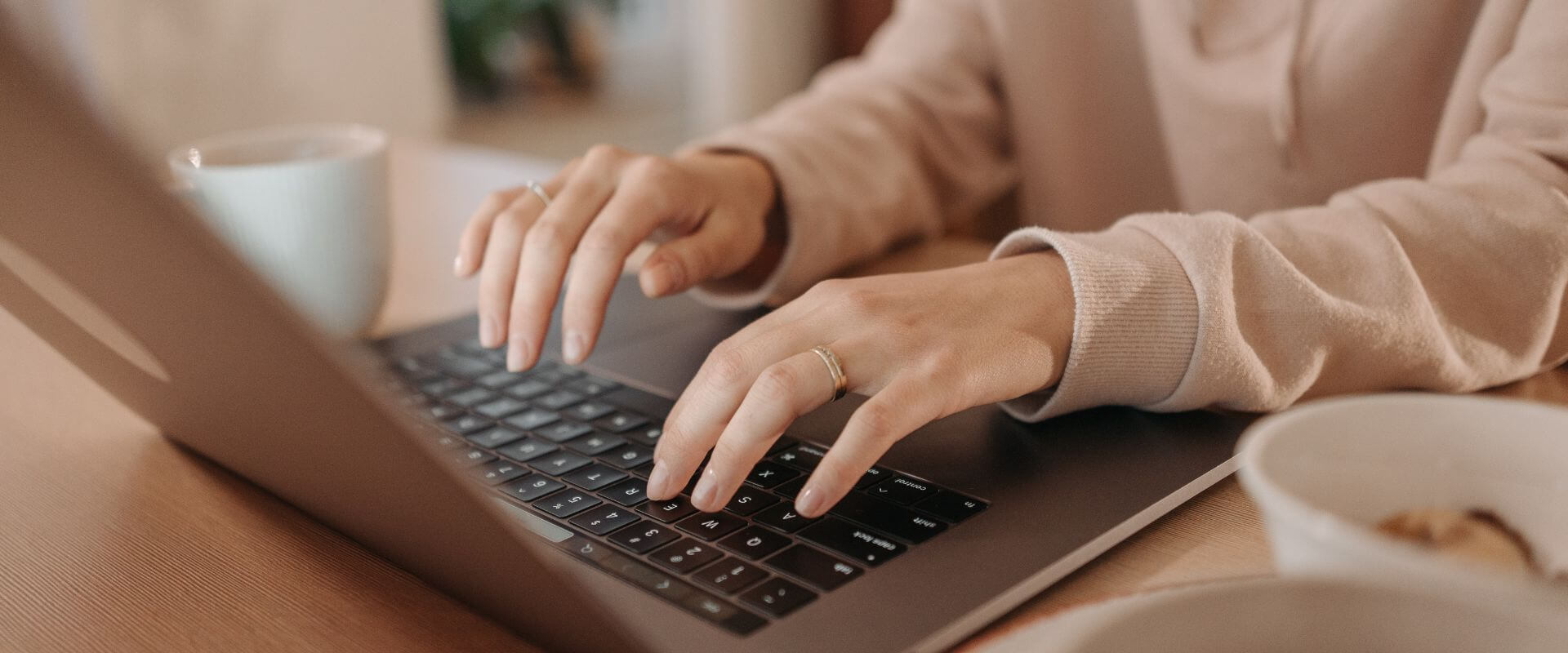 Frustrated Employee at Computer Hands Over Eyes