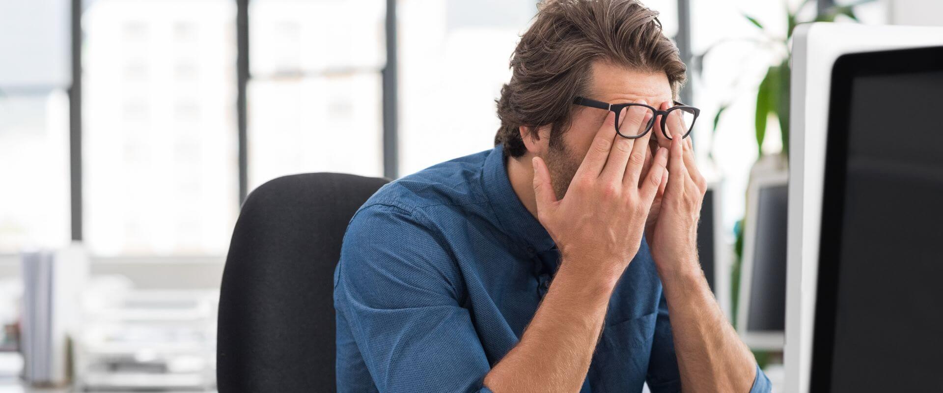 Frustrated Employee at Computer